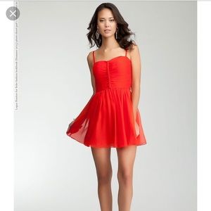 Bebe flirty flow mini cocktail dress orange/red